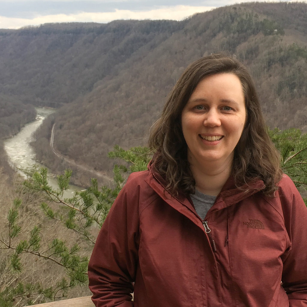 kate with mountains behind her